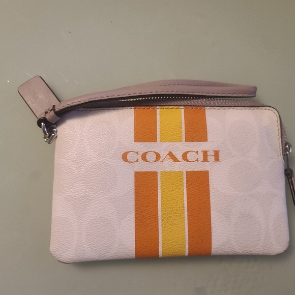 Coach Handbags - COACH Zip Wristlet in White with Orange & Yellow Stripes
